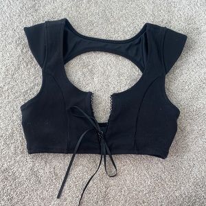 Black lace up Beach Bunny sports bra.